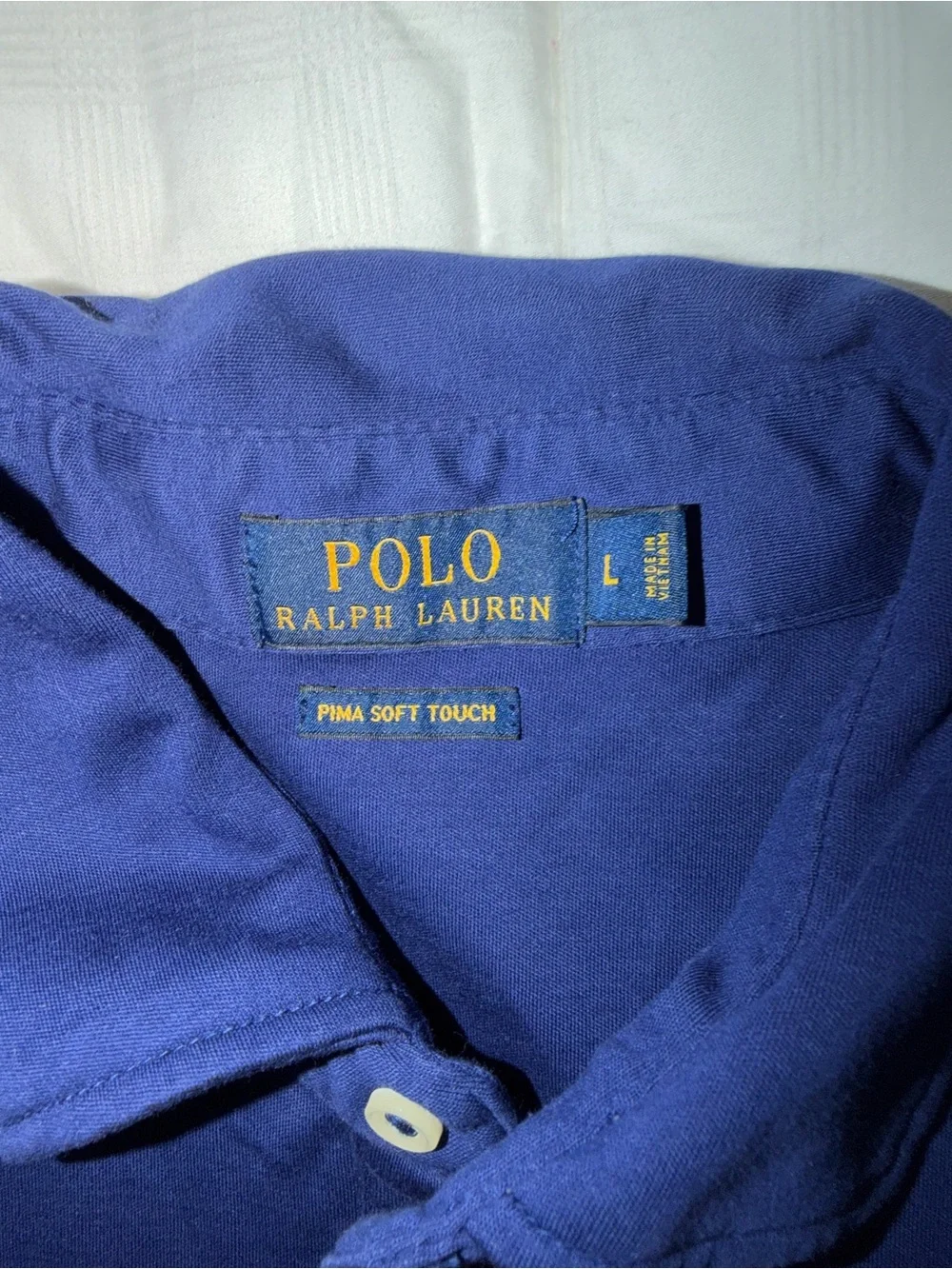 Ralph Lauren Polo Short Sleeve in Deep Blue with Yellow Logo.
